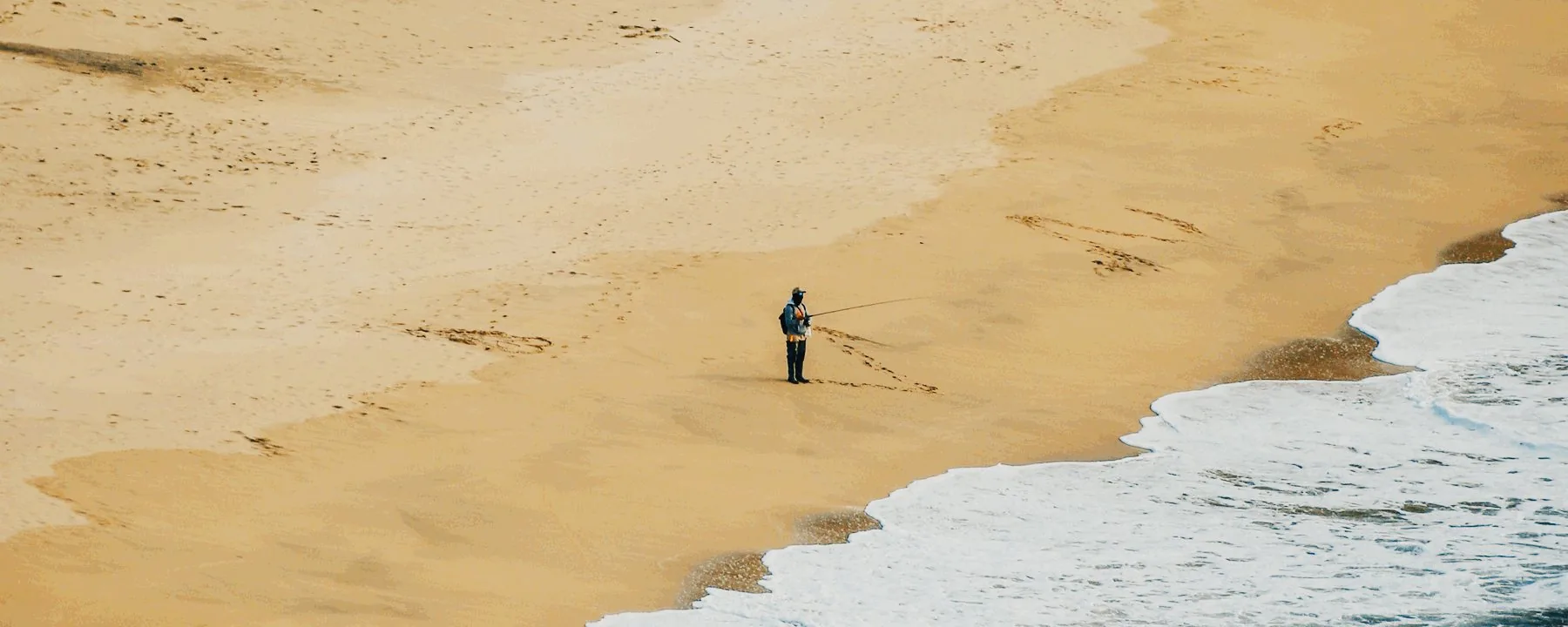 A beach at dusk rendered through Portra 400 by GlassMeter's film pipeline