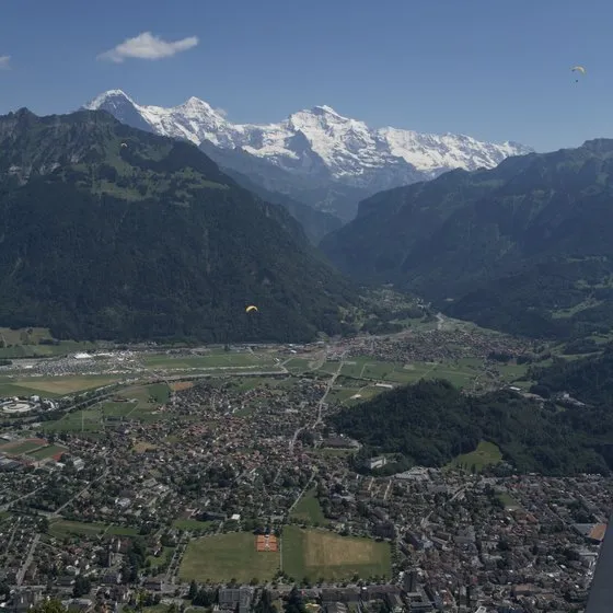 The same mountain valley rendered through different film stocks